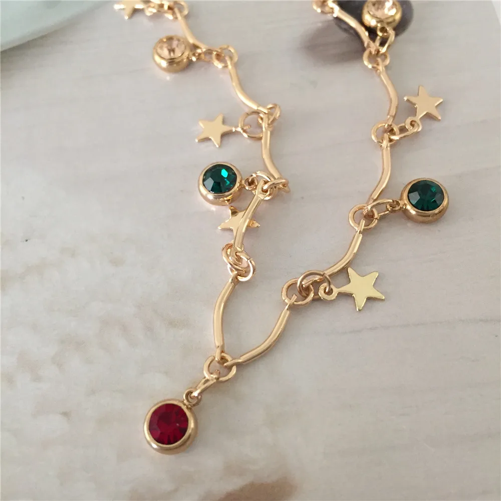 Цепочка-чокер акриловая в стиле бохо золотого цвета с подвеской виде звезды для