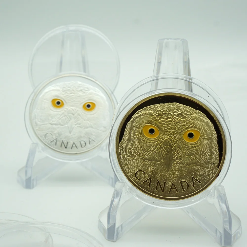 Монета с золотым и серебряным покрытием в виде канадского животного 1 унция -