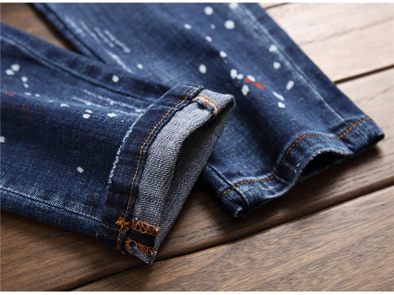 

New Men's male casual fashion embroidery patchwork buttons fly jeans Slim skinny painted holes ripped denim pants trousers 1043