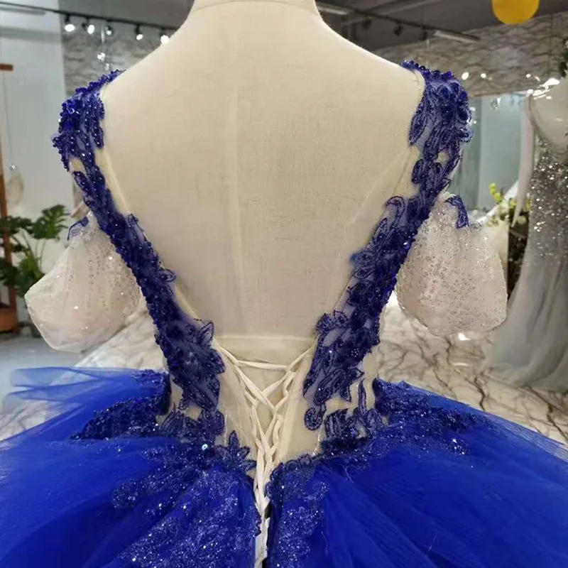 Синее вечернее платье с v образным вырезом без рукавов|Вечерние платья| |