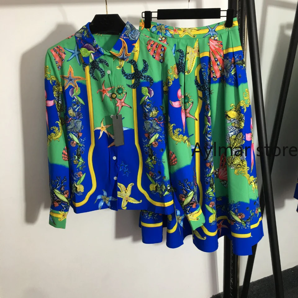 

Luxury Design 2021 autumn new starfish shell print Lapel long sleeve shirt + high waist pleated skirt women's large suit