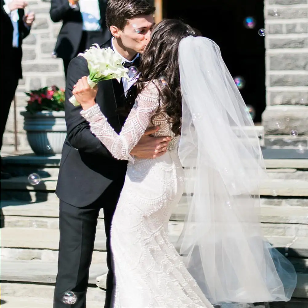 Богемное кружевное свадебное платье с глубоким v образным вырезом русалки