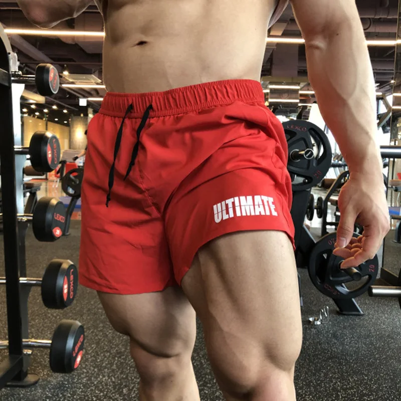 

Summer new sports quick-dry three-point shorts men's elastic fitness gym bodybuilding muscle tide brand training hot pants