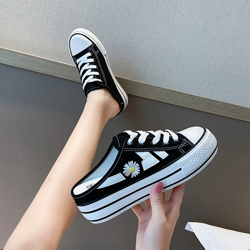 

2021 summer thick bottom small daisy canvas shoes women's leisure half tray inner heightening muffin shoes women's fashion