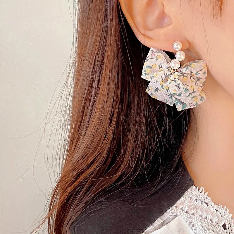 

S925 Silver Needle Temperament Bow Earrings Trendy Fairy Sweet Pearl Earrings Elegant Earrings