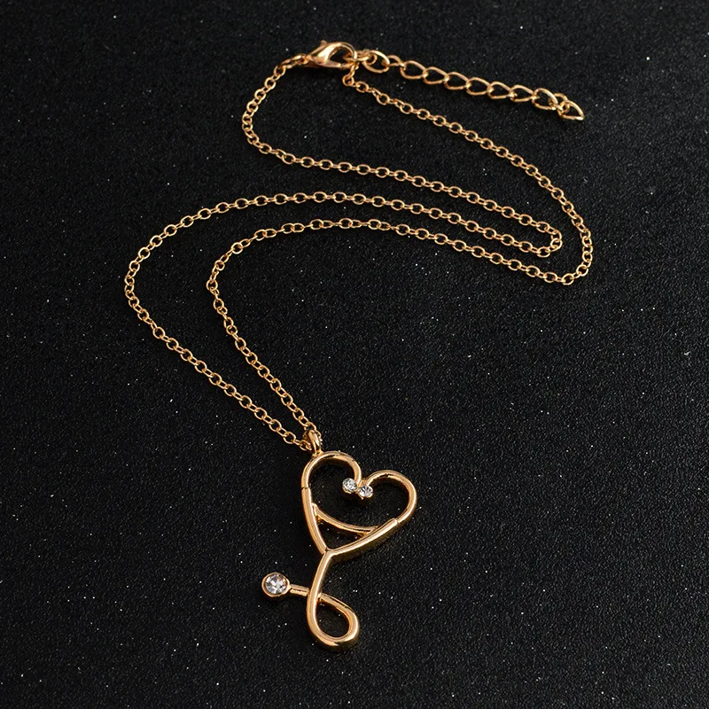 

Creative stethoscope pendant necklace cute smiley peach heart inlaid zircon necklace fashion charm lady party birthday gift