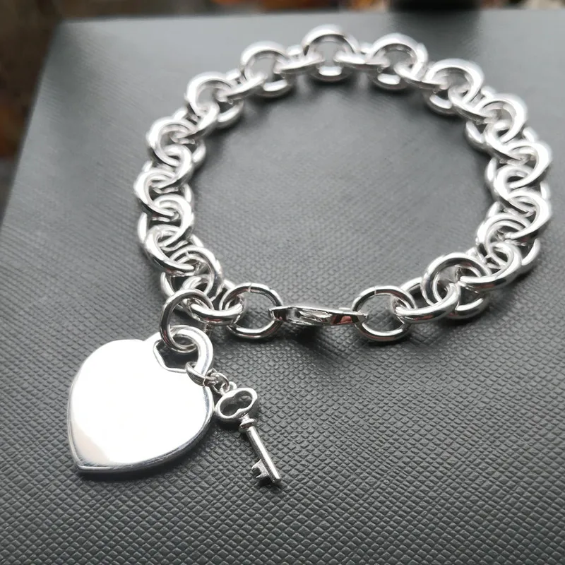 

1.1S925 Sterling Silver Ladies Classic Heart-Shaped Tag O-Chain Silver Bracelet Jewelry Couple Holiday Gift