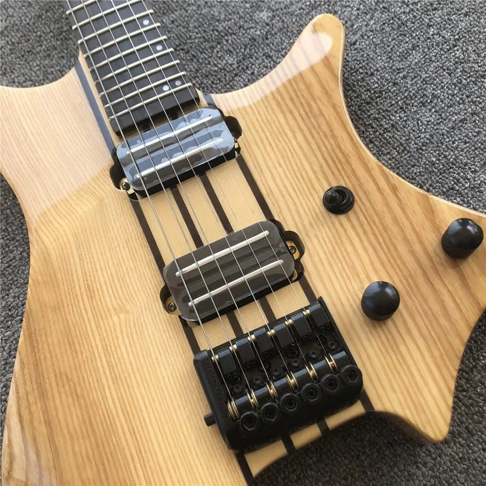 

Grote Maple Neck Through Body Headless Electric Guitar,Rail Dual Pickups,Gloss Finish Natural Color ASH Body Guitara