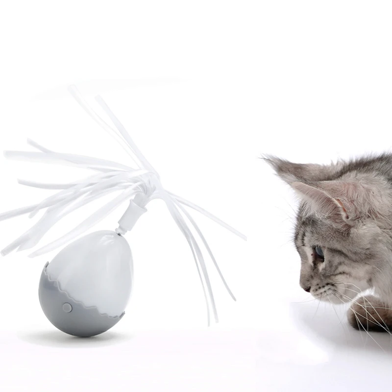 Электрическая игрушка для кошек - вращающийся автоматический мячик с перьями, создающий движение и интерактивное взаимодействие с животным.