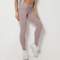 large size pockets hollow stitching hip lifting tights womens sports running yoga pants