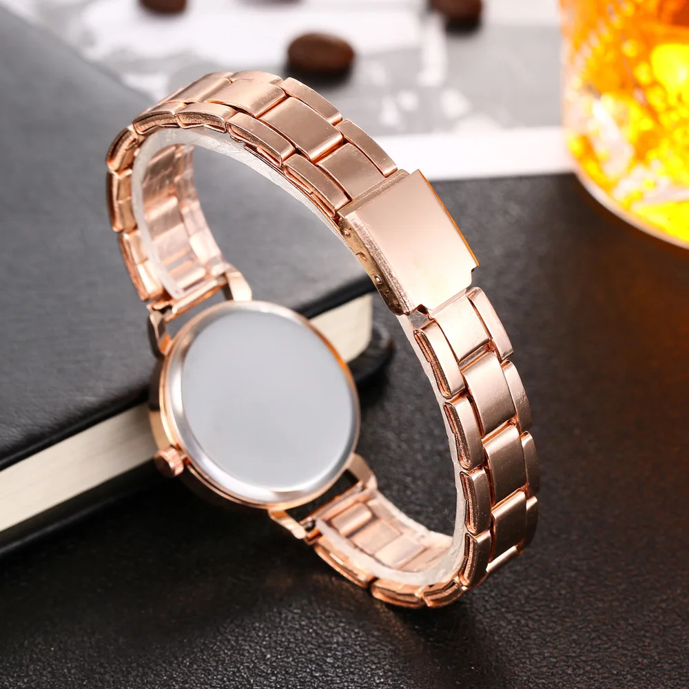 

2021 Hot Selling Simple Bar Nail Scale Alloy Steel Belt Watch 12-Head Thin Band Rose Gold Women's Quartz Watch