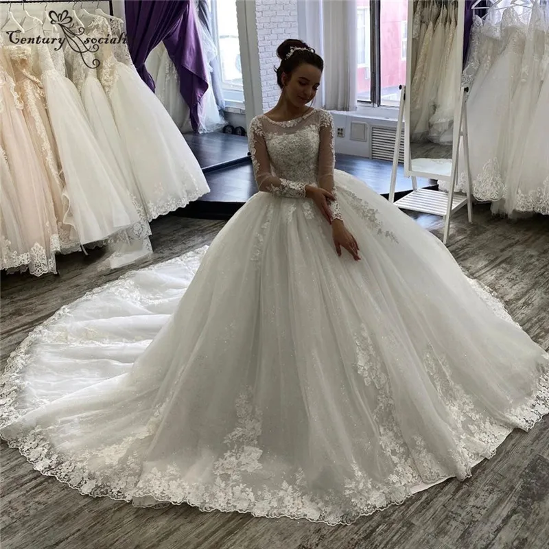 

Luxury Princess Wedding Dress 2020 Ball Gown Bride Dresses Lace Applique Beaded Glitter Long Sleeve Plus Size Bridal Gowns
