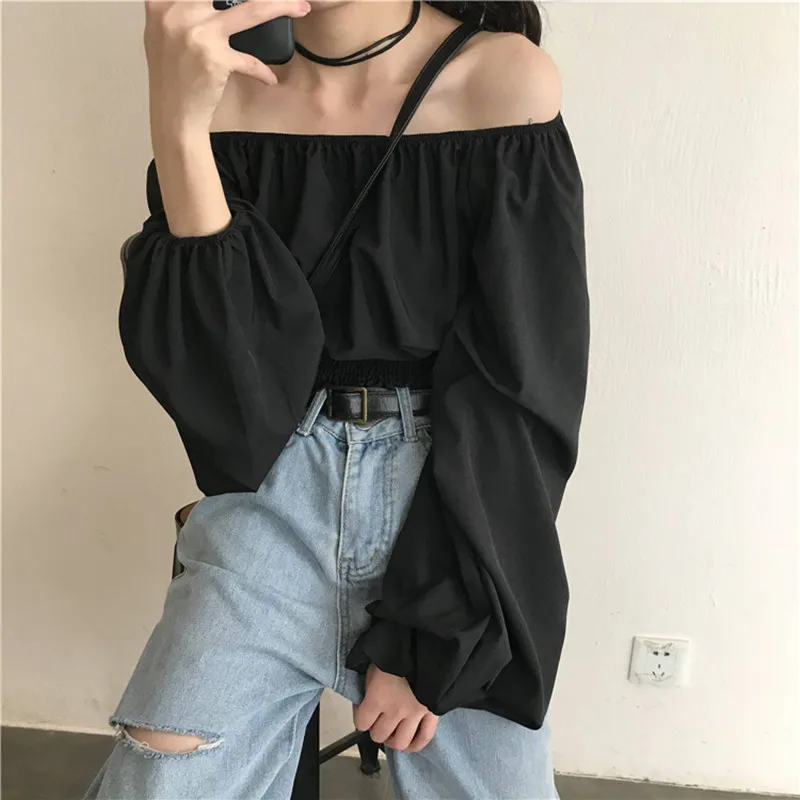 

One-shoulder black long-sleeved shirt female design sense spring cropped short puff sleeve top