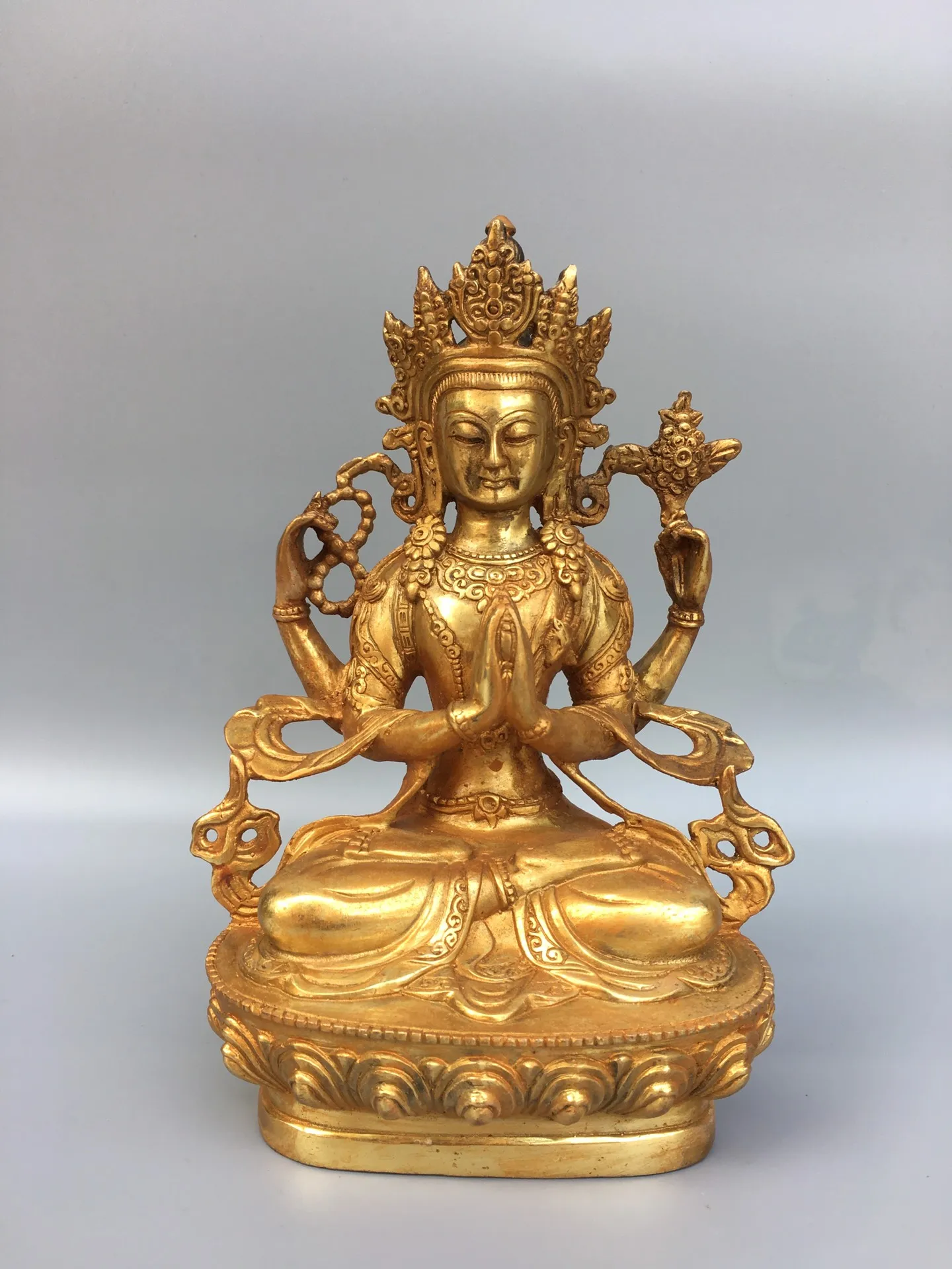 

9"Chinese Folk Collection Old Bronze Gilt Four-armed Guanyin Bodhisattva Sitting Buddha Office Ornaments Town House Exorcism