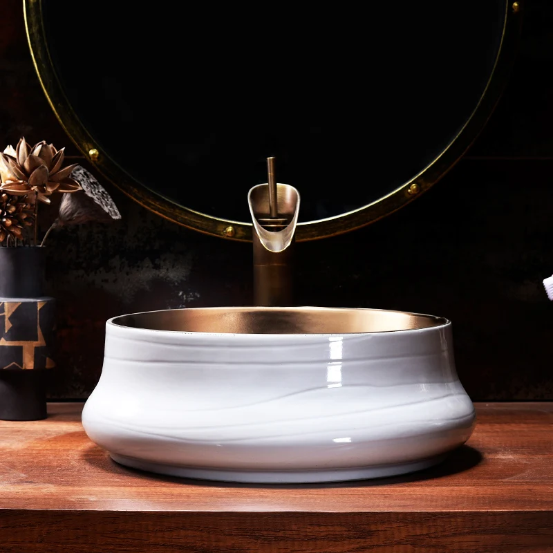 Золотая керамическая раковина столешница для умывальника ванной комнаты сосуд