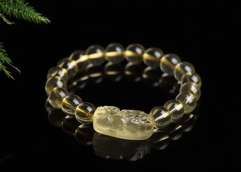 Браслет из натуральных желтых кристаллов ювелирное изделие с мотивами монет