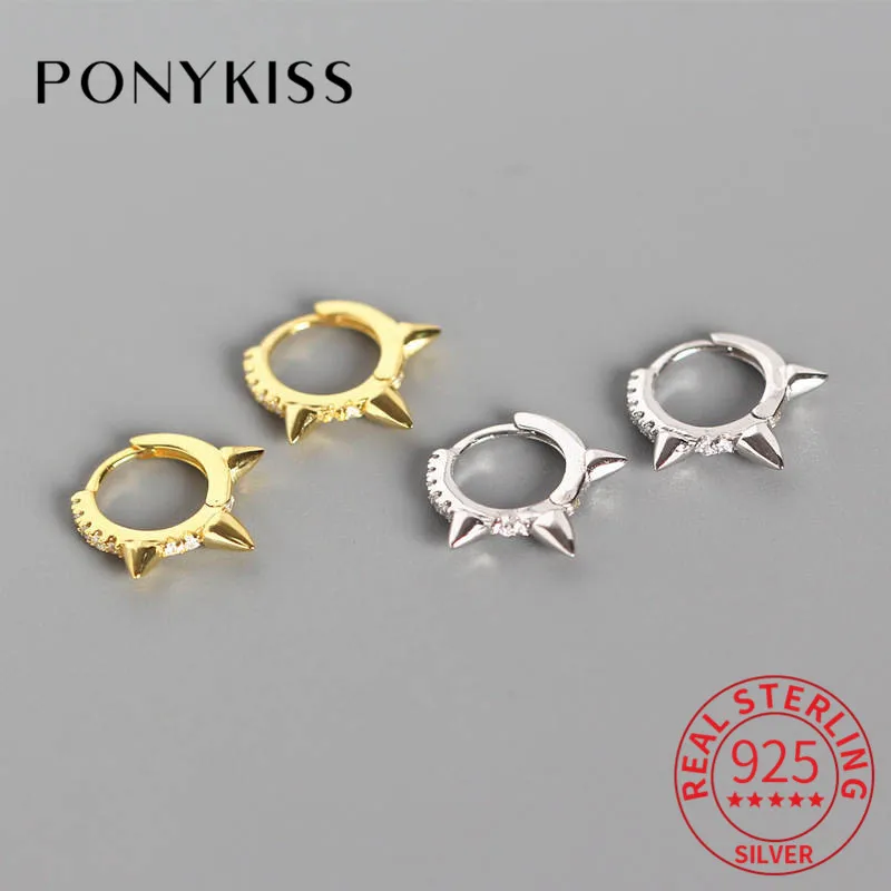 

Серьги-кольца из серебра 925 пробы с фианитами и заклепками