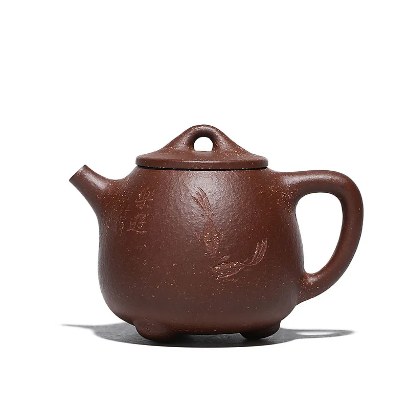 

Semi complete handmade teapot with purple clay