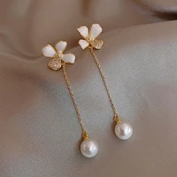 xiyanike white flower enamel long drop earrings for women alloy tassel pearl earrings 2021 trend fashion party jewelry brincos