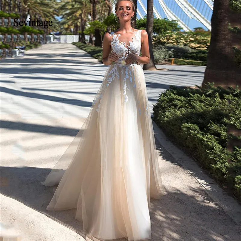 

Sevintage Cheap A Line V Neck Lace Boho Wedding Dresses Plus Size Tulle Backless Wedding Bridal Gowns 2020 Beach robe de mariée