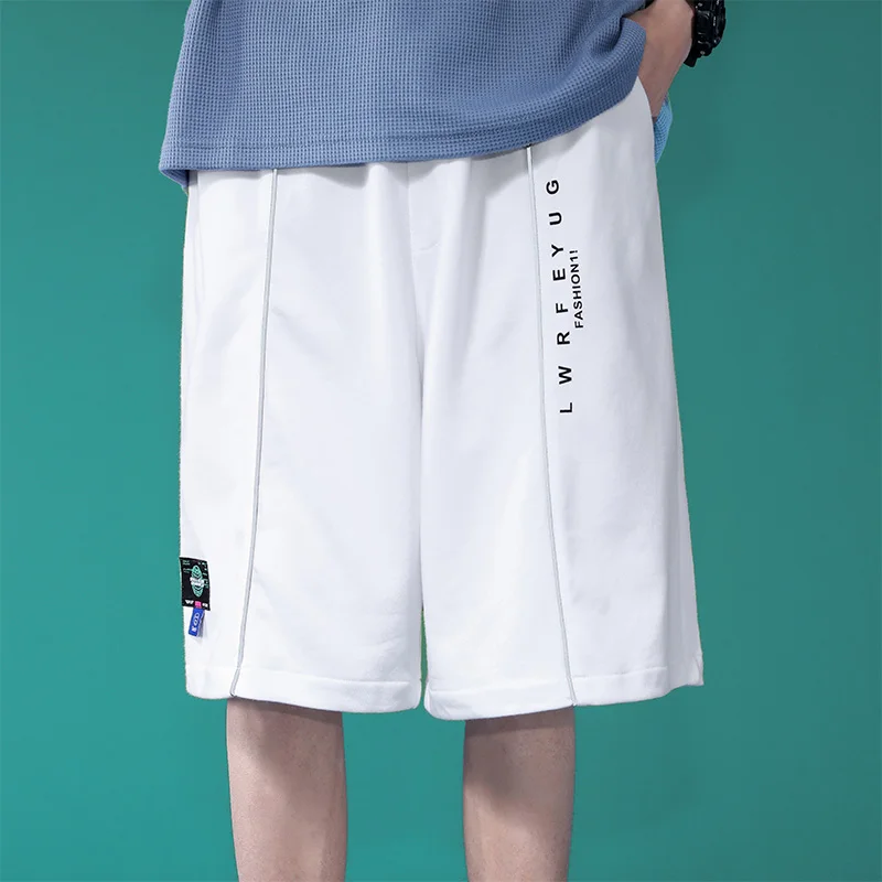 

New summer shorts men's five minute trousers straight loose thin leisure sports trousers popular logo false two big pants 81046