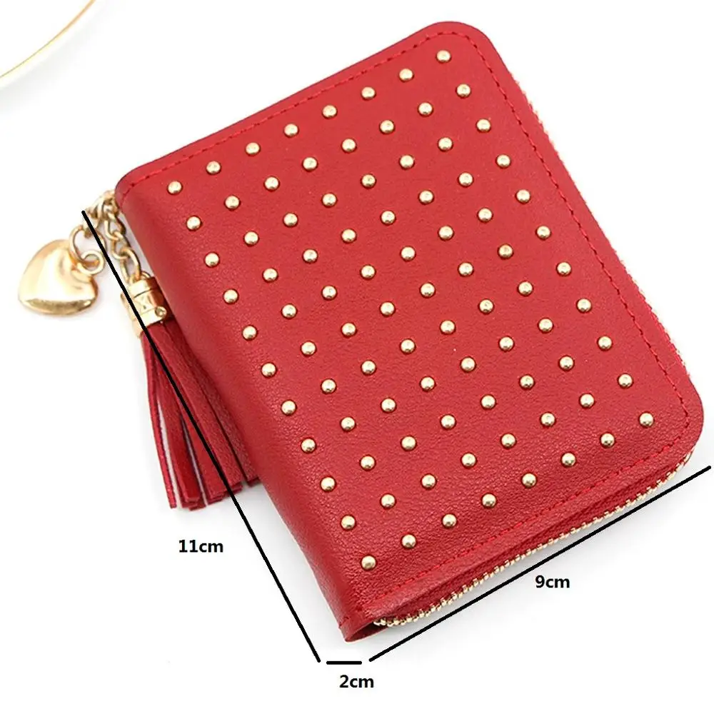 Кожаный кошелек с заклепками и кисточкой на молнии для женщин однотонный