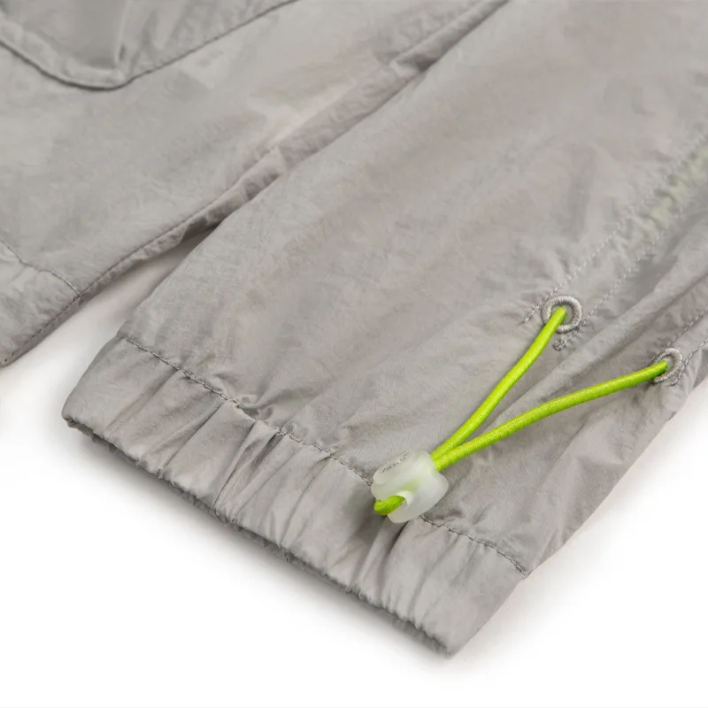 

2021 summer new simple pure color quality sunscreen clothing color collision rope collage pocket coat male