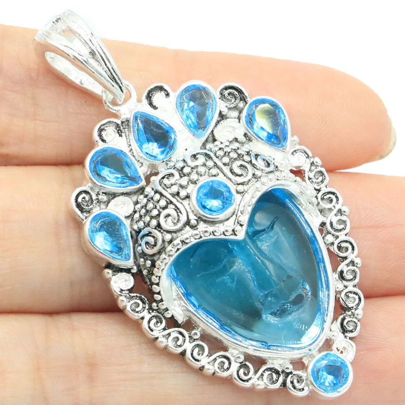 53x28 мм, привлекательное лицо богини 16,4 г, аквакварцевое искусственное перидомное оформление, женское знакомство