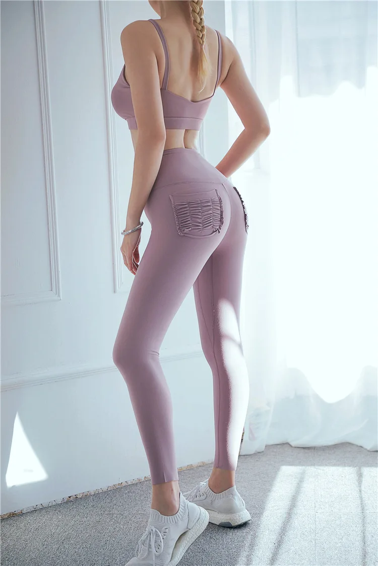 

2020 New Solid Color Pocket Peach Hips Sports Fitness Pants High Waist Running Tight Sports Training Yoga Pants Women