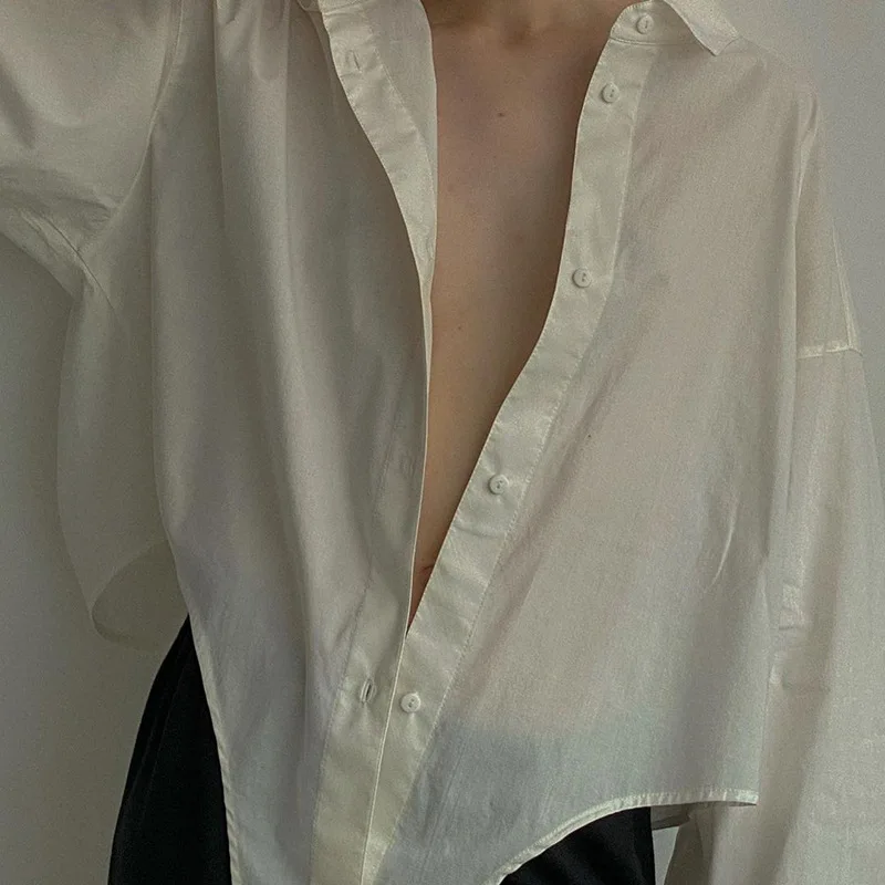 

2021 Korean Fashion Personality Long Sleeve Irregular Shirts Women Casual Loose Solid Polo-neck Button Shirt Summer Ladies Tops