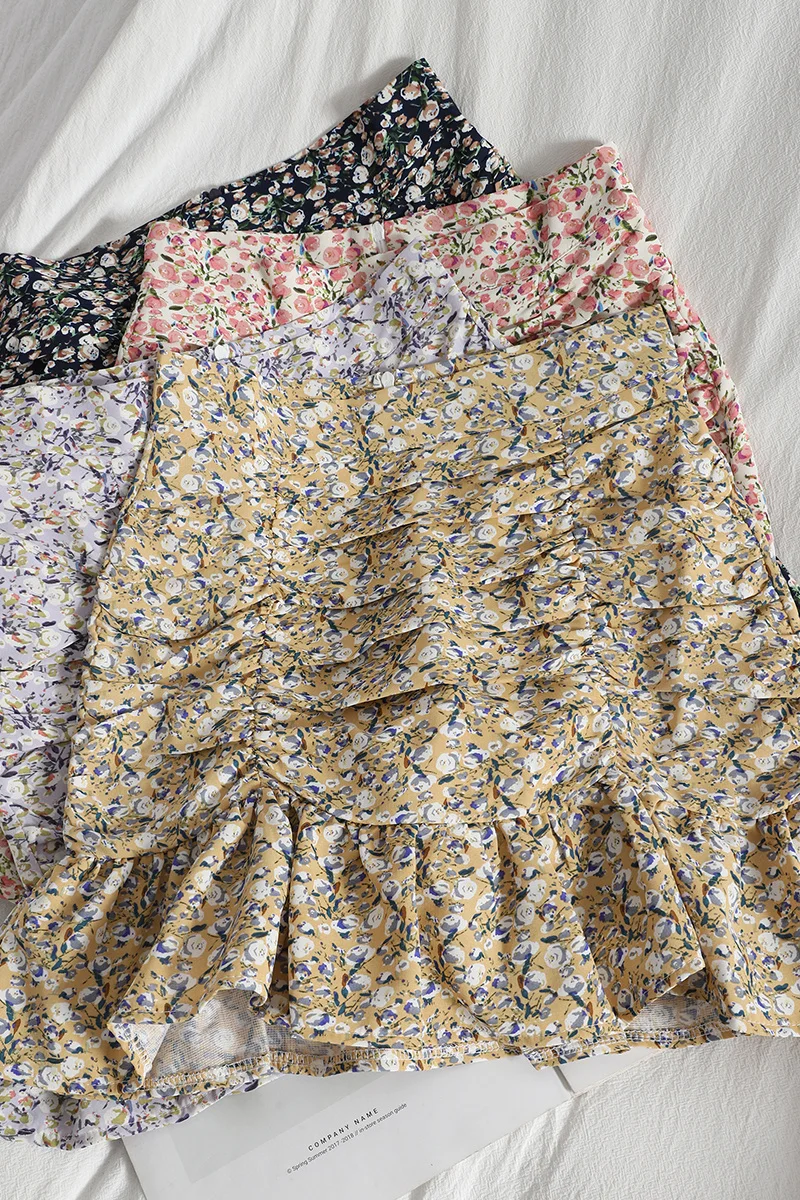 

Layer upon layer pleated buttock skirt new spring and summer age reducing small fresh floral skirt looks thin and versatile