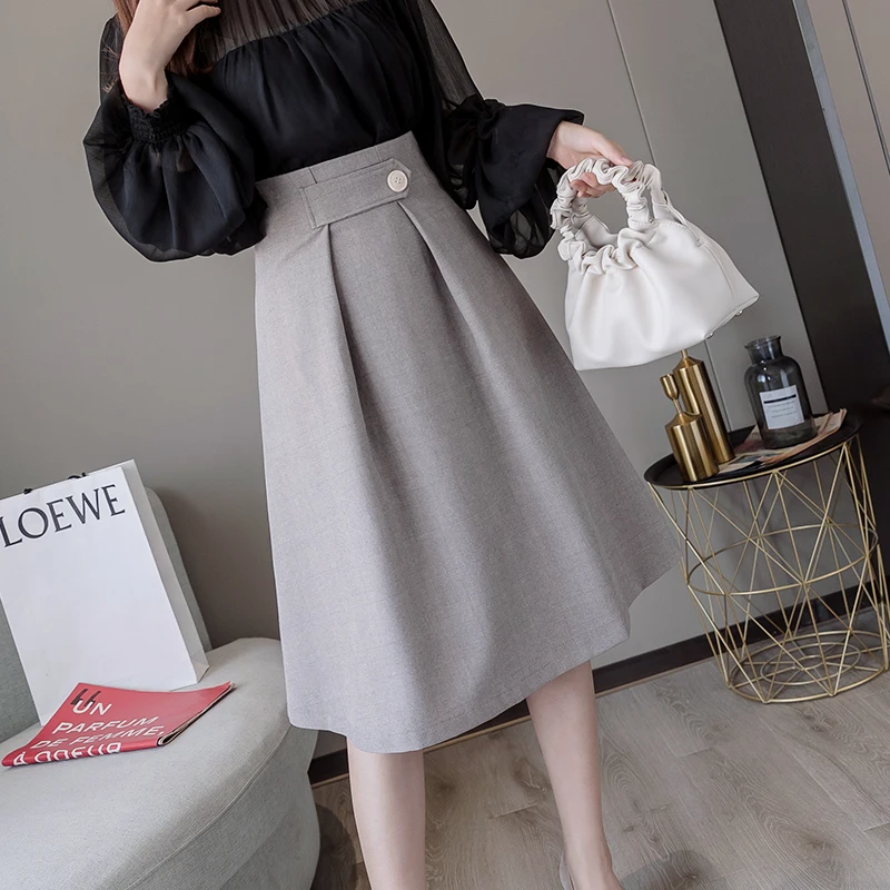 

2021 Autumn High Waist Korean Fashion Retro Hong Kong Style Simple Button Medium Length Skirt Large Swing Skirt Women's Skirt