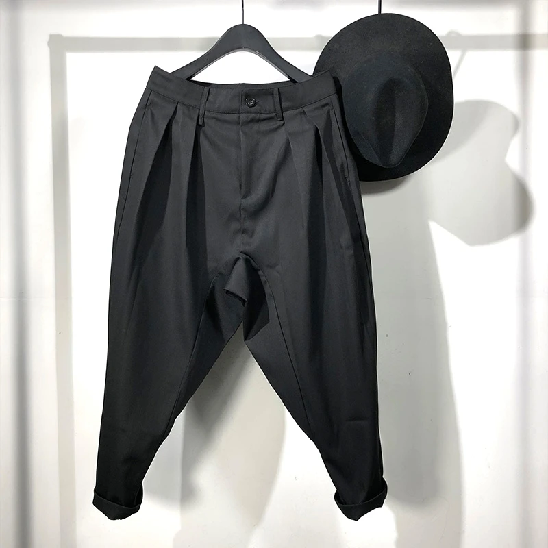 

2020!The new oversize black tide men's loose haren corset pants popular logo show the trend of slim casual pants in spring .