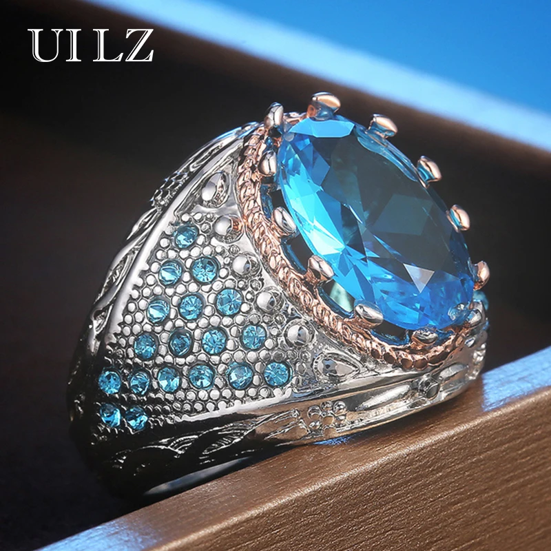 

Uilz Luxury Two Tone Design Women's Rings Blue Oval Cubic Zirconia Noble Wedding Anniversary Gift Female Ring Drop Shipping