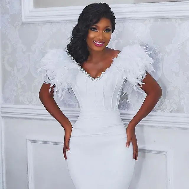 

Vestidos De Novia Africa Mermaid Wedding Dresses Sweep Train Sweep Train Satin Feather Sleeves Lower Back Bridal Gowns