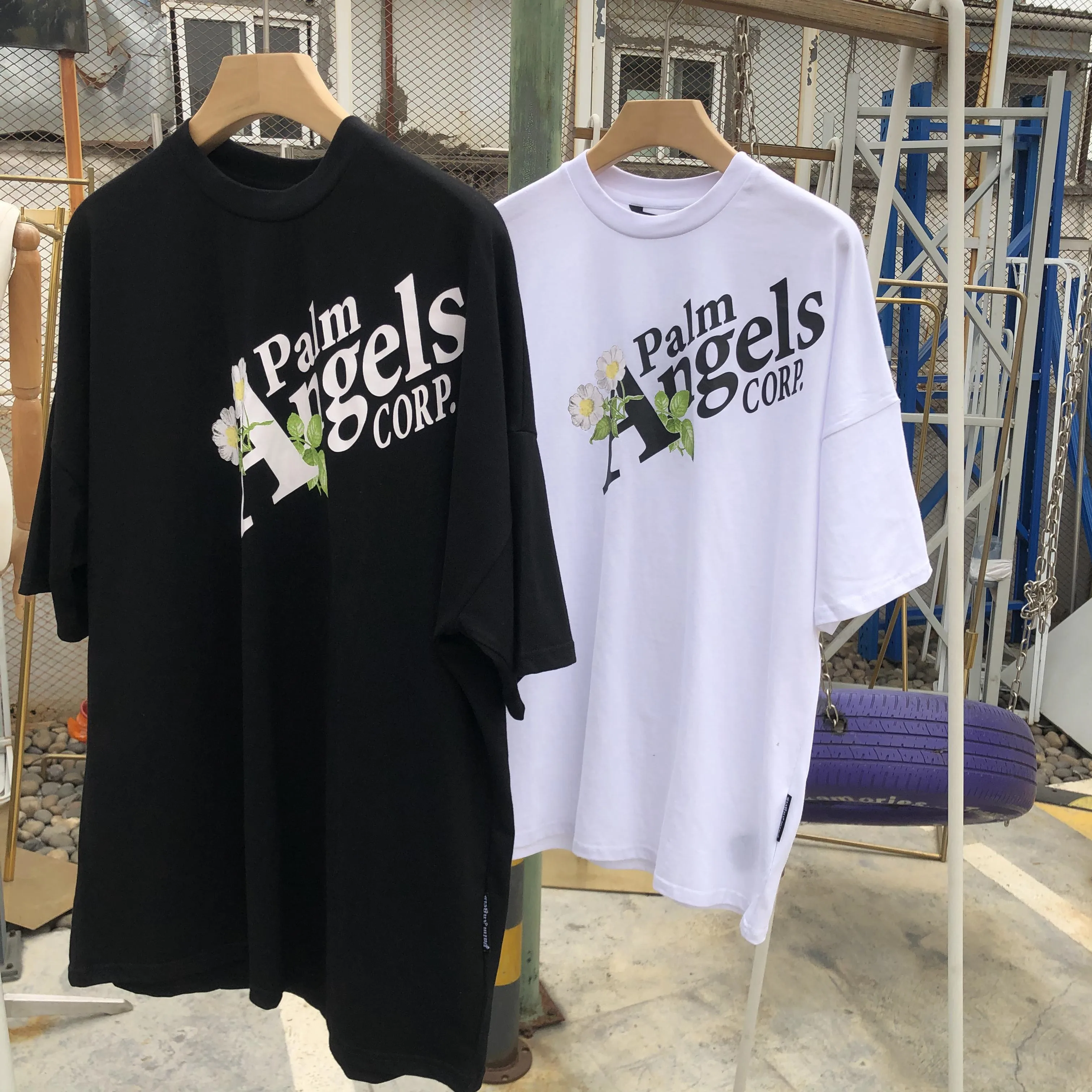 

Palm Angels plant flower letter printing men and women drop shoulder short-sleeved loose all-match T-shirt