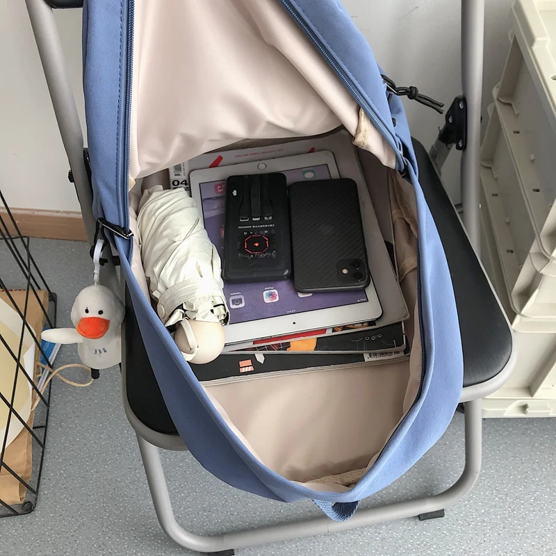 

DIFA Solid Letter Printing Waterproof Nylon Women Backpack Female Large Capacity High SchoolBag Unisex Multi Pocket Travel Bag