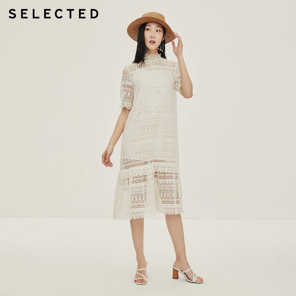 Женское кружевное платье средней длины со стоячим воротником и вырезами модель S