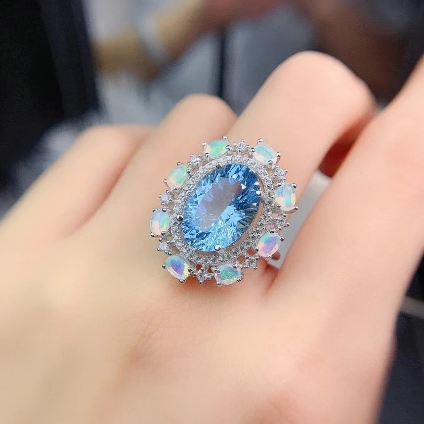 Кольцо из серебра 100% пробы с натуральным голубым топазом опалом