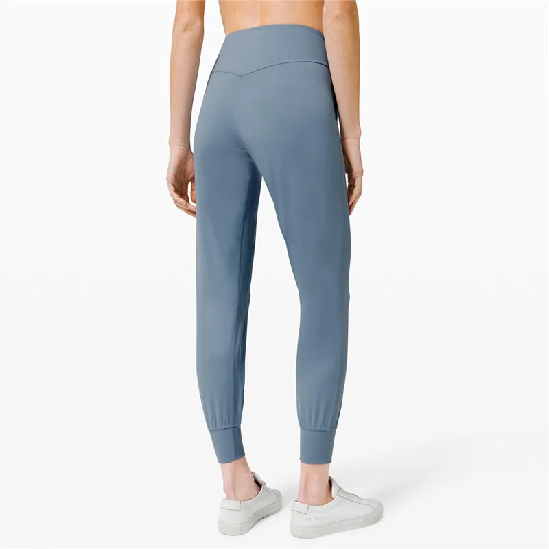 

Naked-feel Fabric Loose Fit Sport Active Lounge Jogger Butter Soft Elastic Leggings With Two Side Pockets Full length Yoga Pants