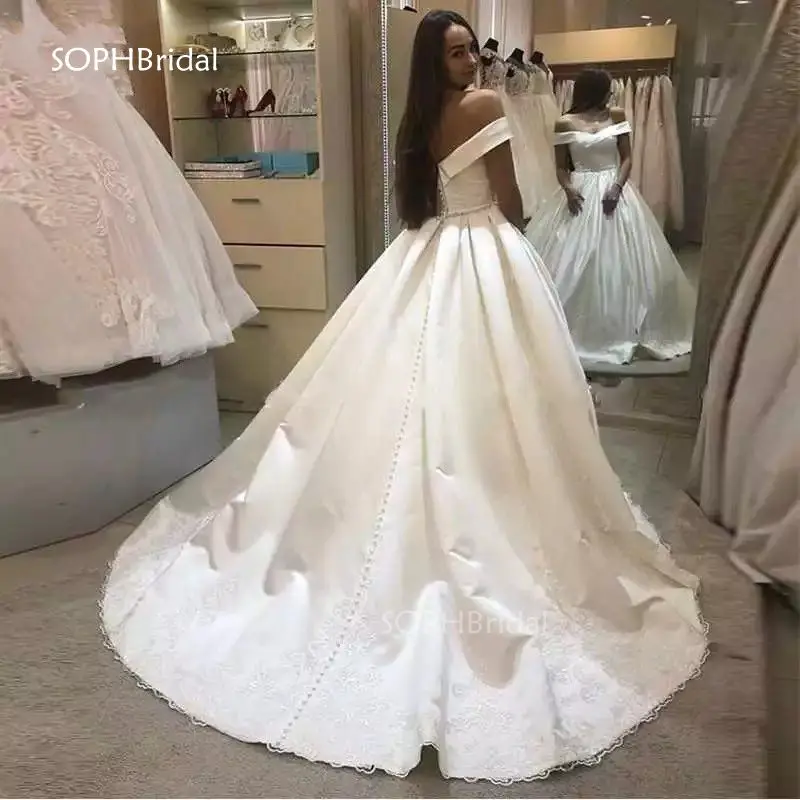 

New Arrival Princess Lace Appliques Wedding Dresses Off the Shoulder Beaded Sashes Satin Button Wedding Bridal Gowns