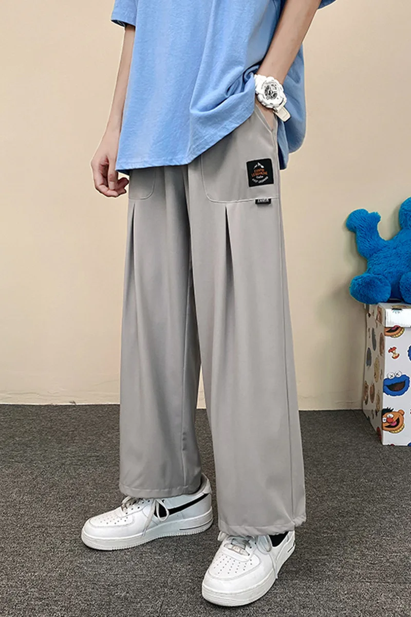 

Ice silk casual pants men's 2021 summer new Hong Kong wind plus size ice silk thin pants tide breathable vertical pants