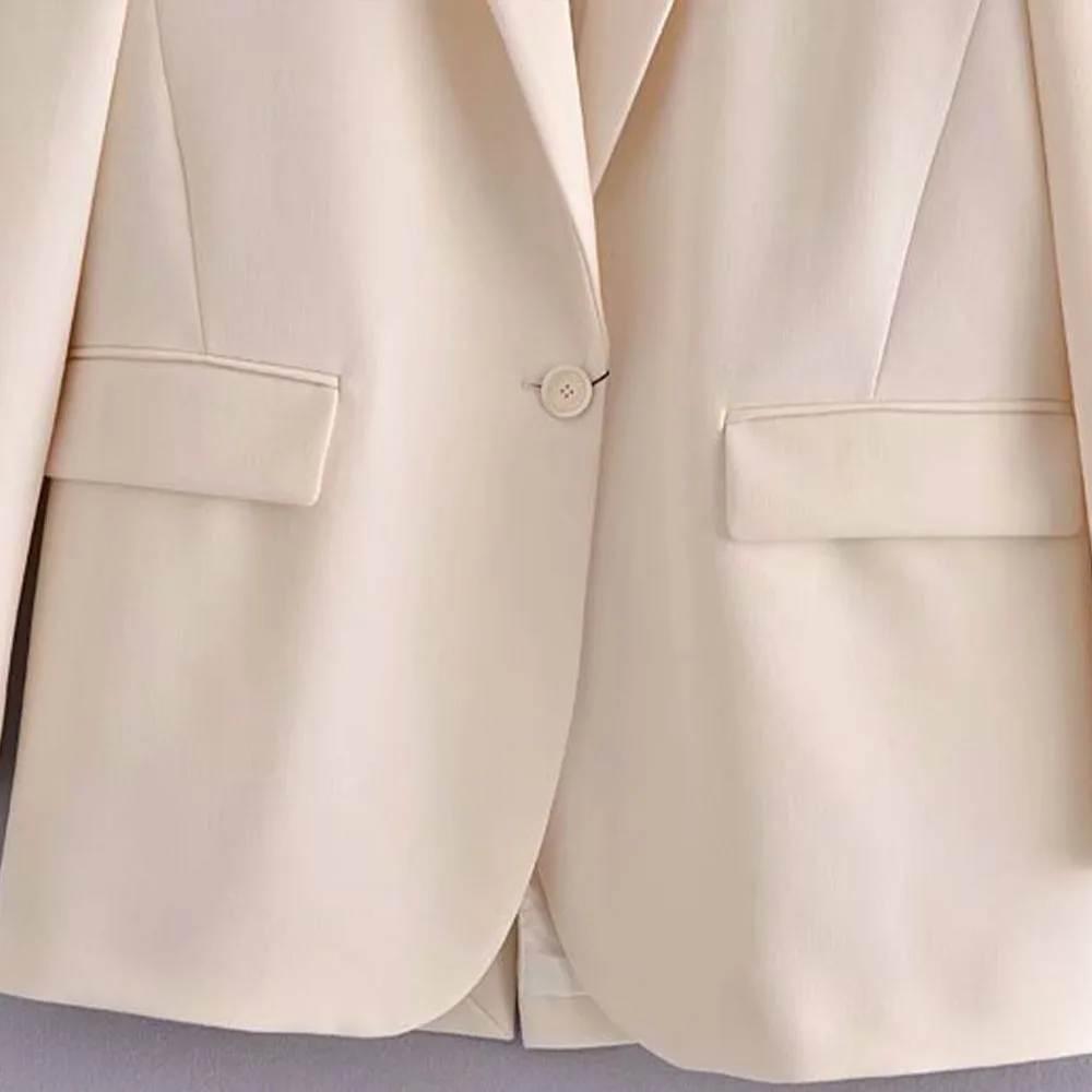 

2021 early spring new Korean style lapel small suit suit jacket female one-button long-sleeved casual pocket decoration