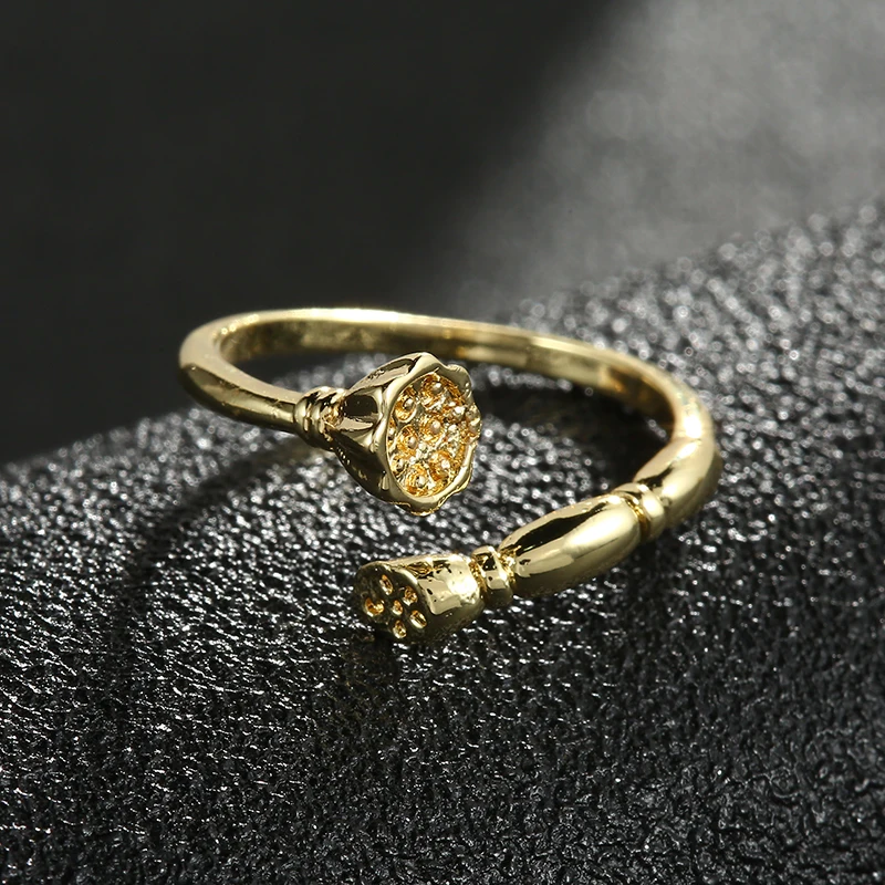 Кольцо женское открытое с лотосом золотистое гальваническим покрытием |