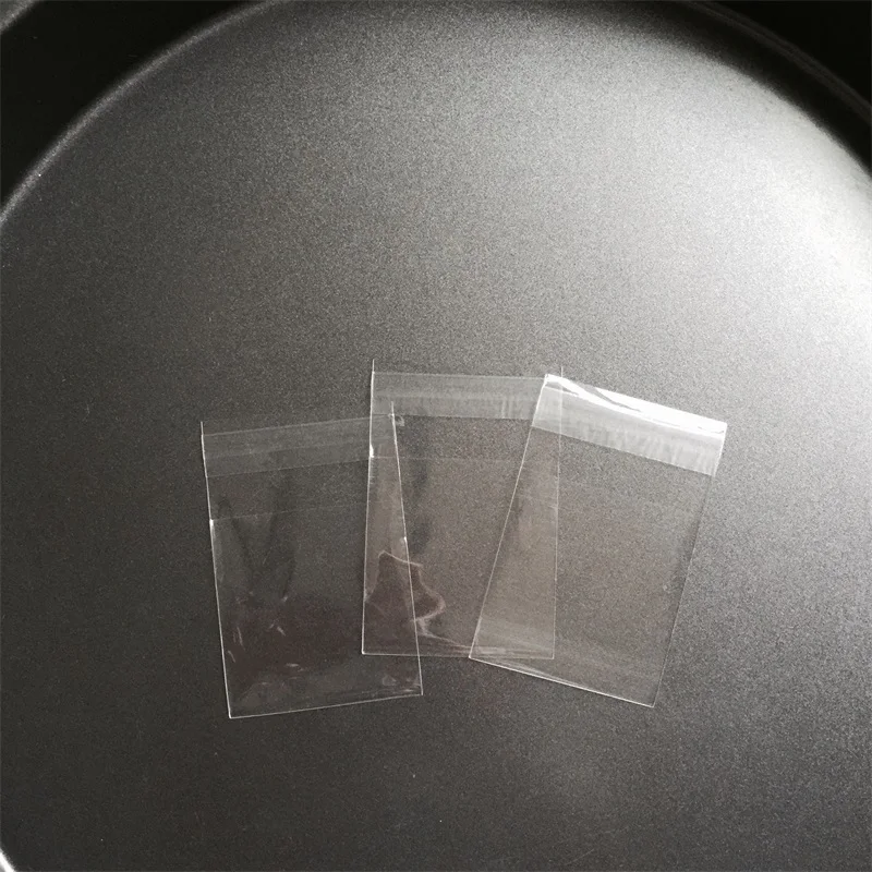 

100pcs/lot 5 Size Transparent Cookie Packaging Bags Self-adhesive Plastic Biscuit Bag Wedding Candy Bags