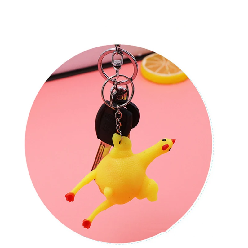 

New Funny Spoof Tricky Gadgets Green Dinosaur Beans Toy Chicken Egg Laying Hens Crowded Stress Ball Keychain Keyring Relief Gift