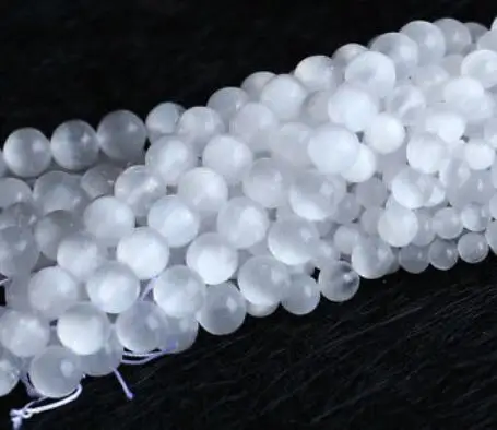 Подлинные круглые ювелирные украшения из белого кошачий глаз Кальцита селенита |