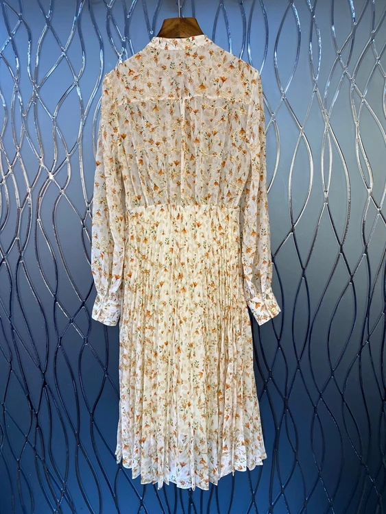 

2021 spring new women's V-neck Ruffle stitching printing pattern decoration perspective long sleeve dress 304