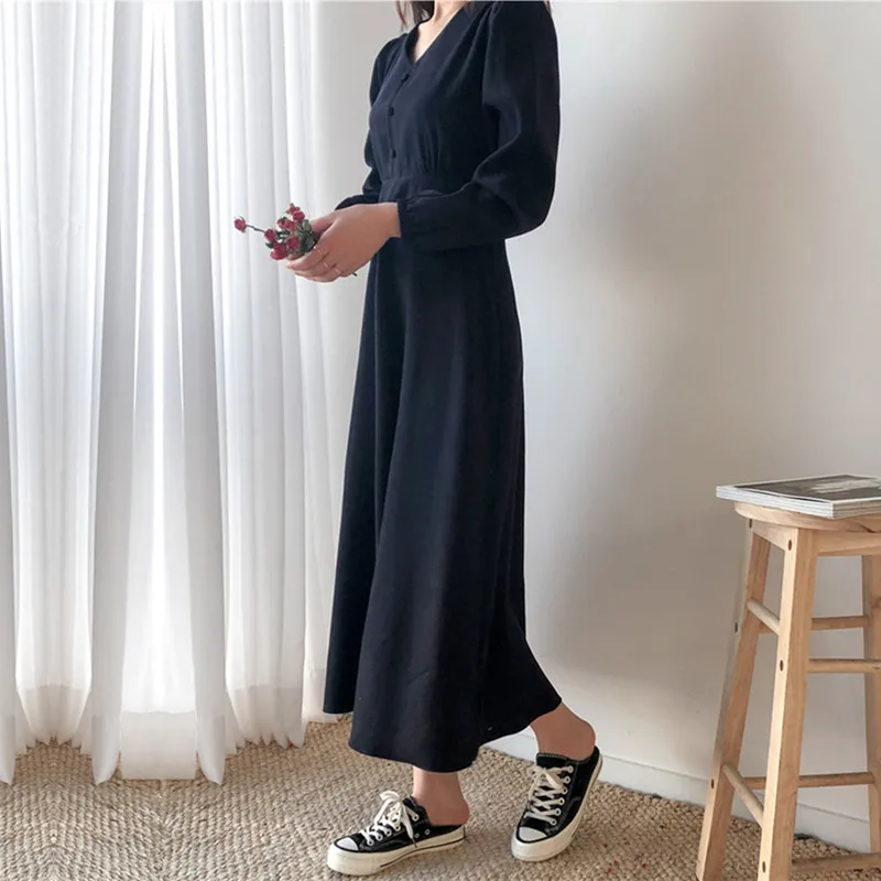 Однобортное платье с V-образным вырезом тонкой талией и плиссированной юбкой |