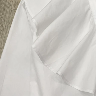 

Temperament Large Lapel Shirt Women's Single-breasted Long-sleeved Cotton White Shirt